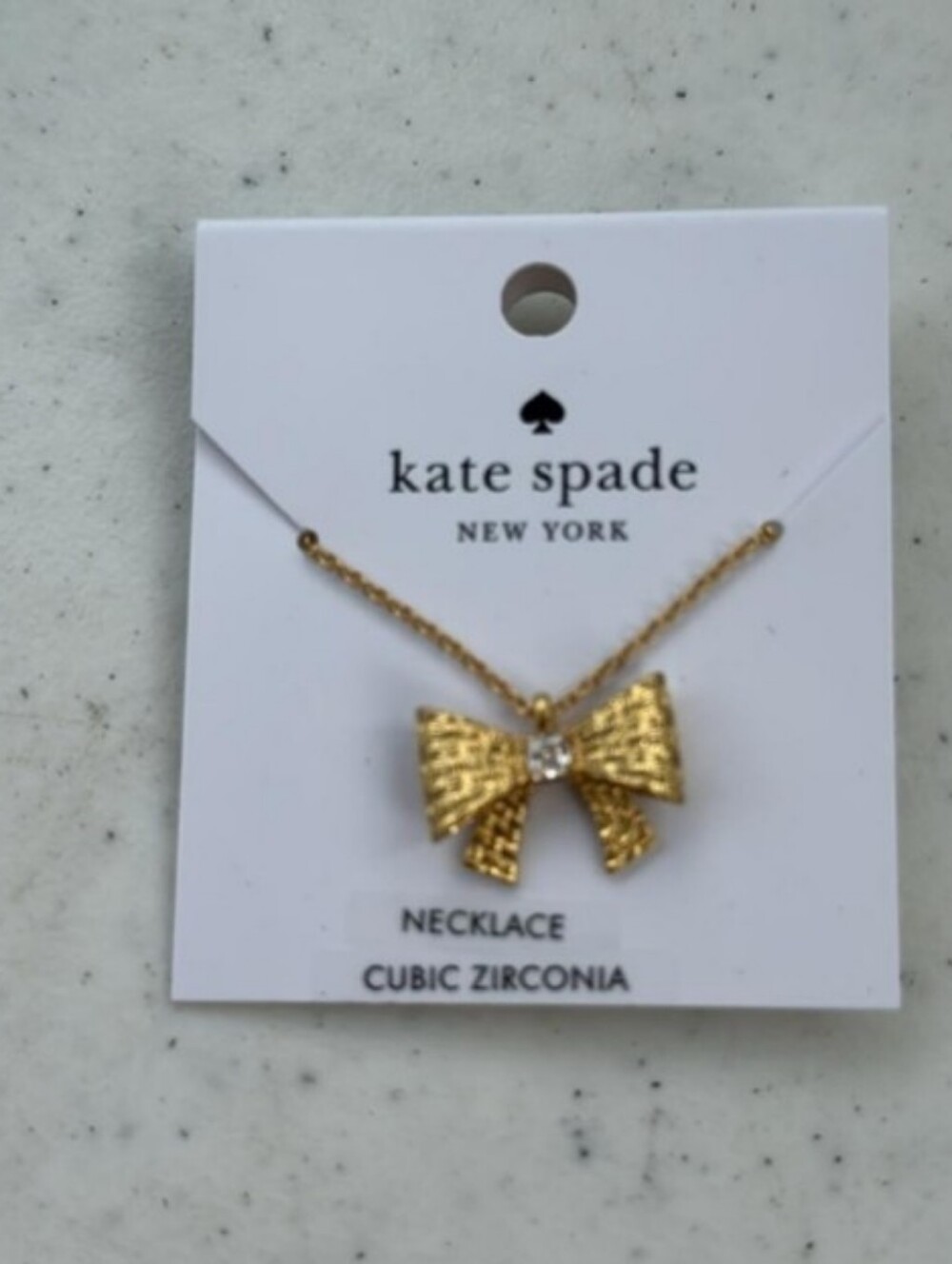 kate spade gold-tone textured bow pendant necklace